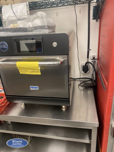 Commercial speed oven installation.