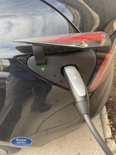 Image of a Tesla charging