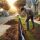image of home owner digging in front yard