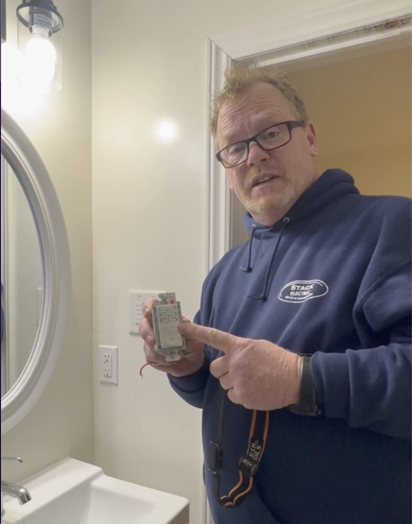 Bathroom exhaust fan installation with timer.